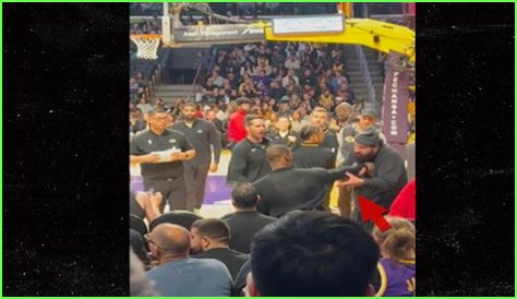 LeBron James Shoves Overzealous Fan Who Rushed Bench